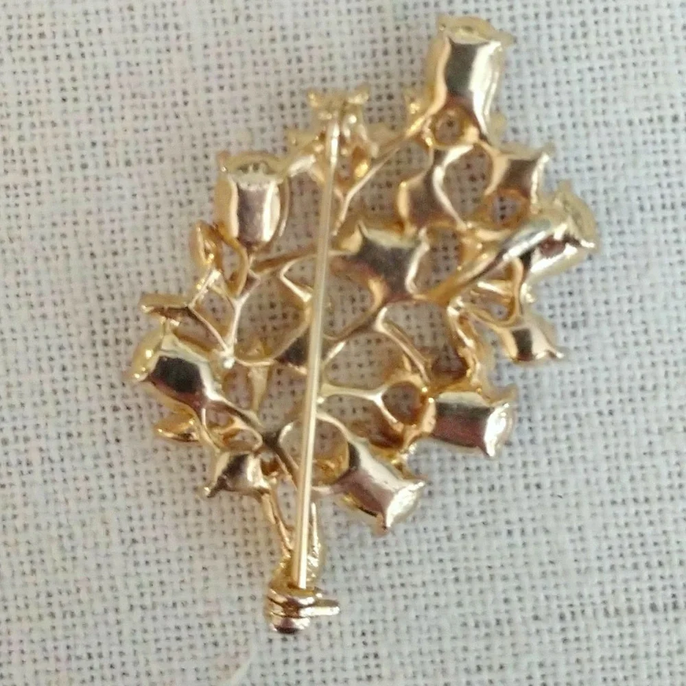 Purple and gold flower brooch